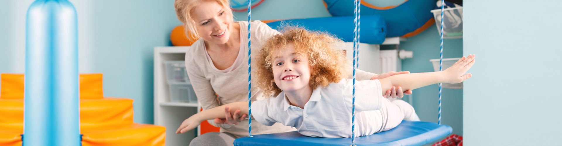 caregiver and child playing