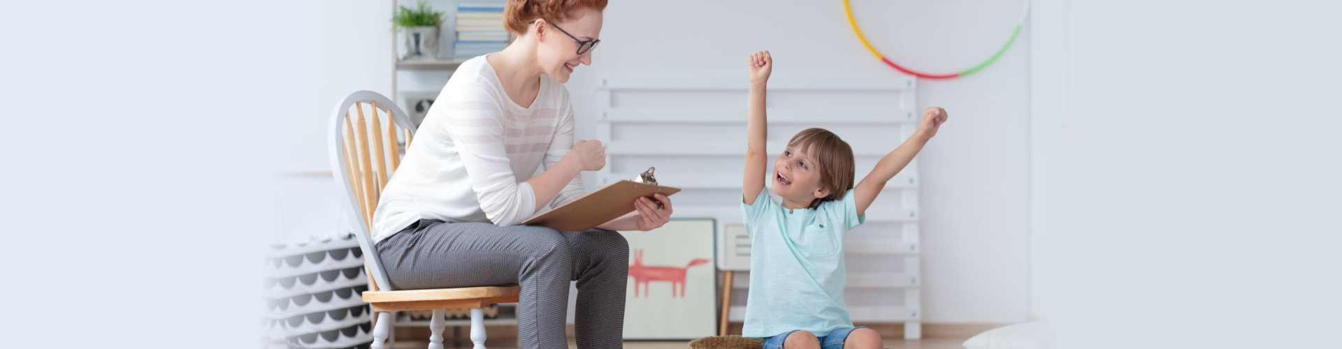 caregiver evaluating a child